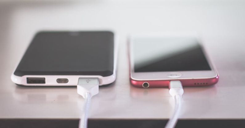 Wireless Chargers - Closed Up Photography of Two Iphones