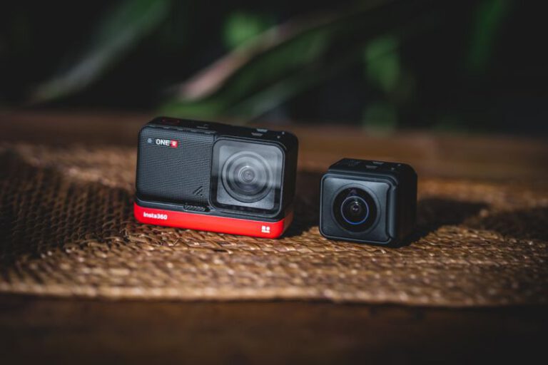 Action Cameras - black and orange camera on brown surface