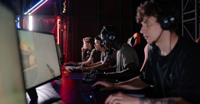 Gaming Headsets - A Team Playing Computer Games