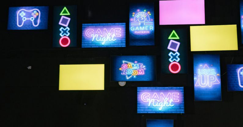 Gaming Monitors - Lighted Screen Monitors Inside a Gaming Computer Shop