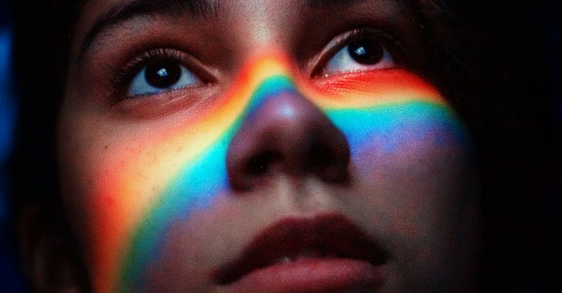 Portrait Photography - Woman With Rainbow Light Reflecting Her Face